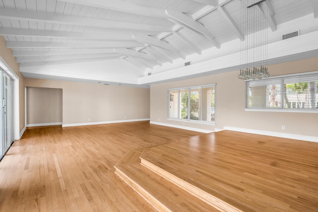 2601 NE 37th St, Fort Lauderdale, FL 33306 - unfurnished living room with baseboards and light wood finished floors