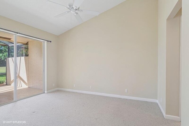 empty room featuring baseboards, lofted ceiling, light colored carpet, and ceiling fan