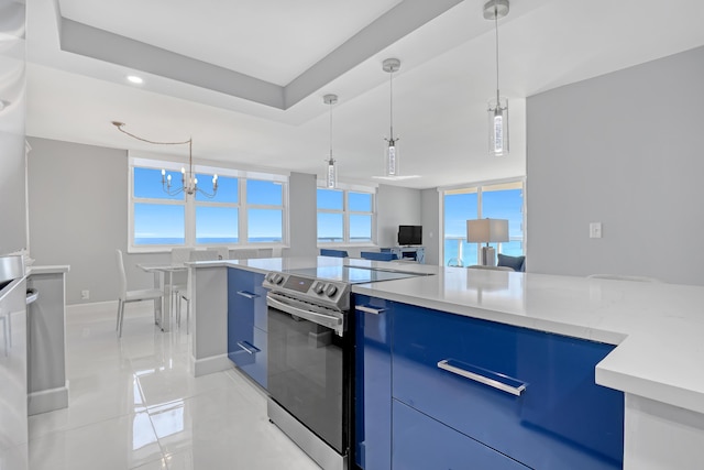 kitchen featuring blue cabinetry, stainless steel electric stove, a wealth of natural light, and light countertops