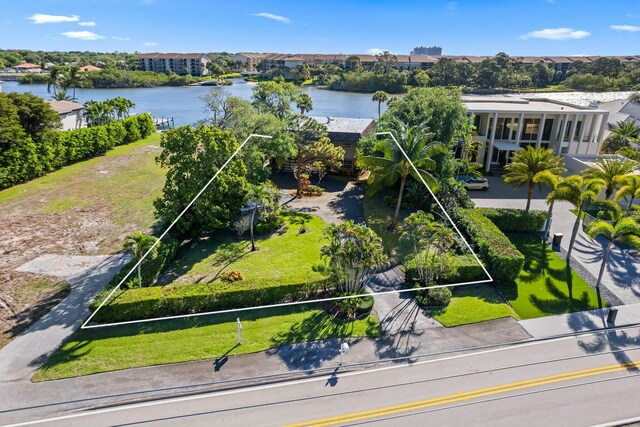 drone / aerial view with a water view