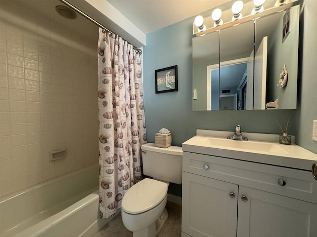 bathroom with vanity, shower / tub combo, and toilet