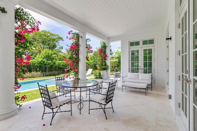 205 Gray St, West Palm Beach, FL 33405 - view of patio featuring french doors and an outdoor pool