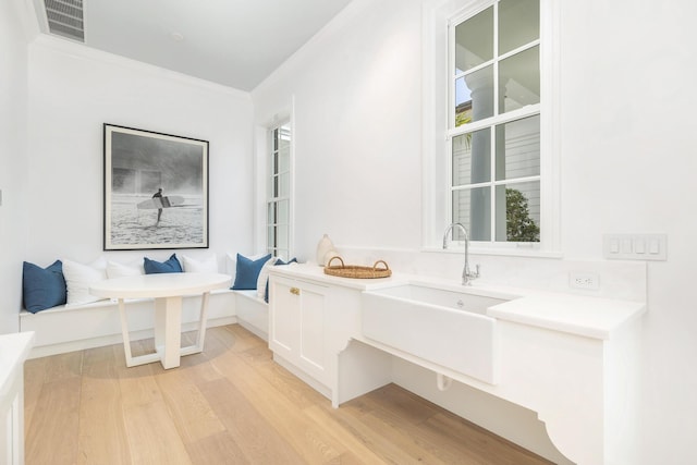 205 Gray St, West Palm Beach, FL 33405 - bathroom featuring wood finished floors and crown molding