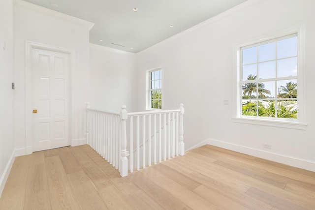 205 Gray St, West Palm Beach, FL 33405 - hall with an upstairs landing, wood finished floors, and crown molding