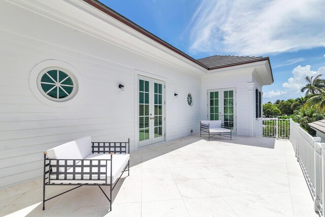 205 Gray St, West Palm Beach, FL 33405 - view of patio featuring french doors and an outdoor living space