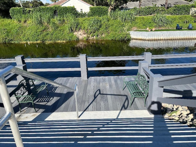 dock area with a water view