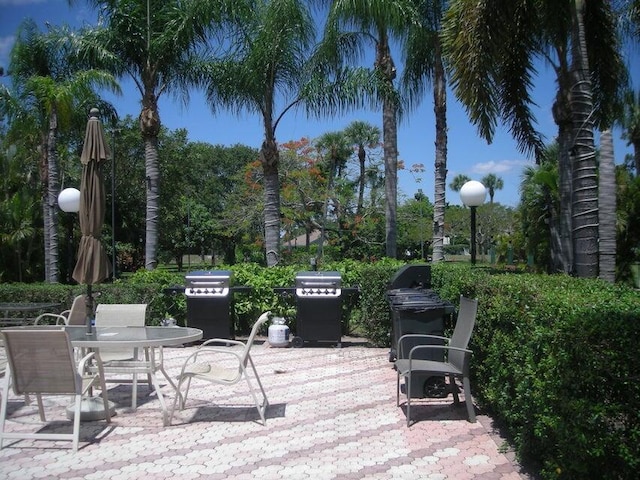 exterior space featuring outdoor dining space and a patio