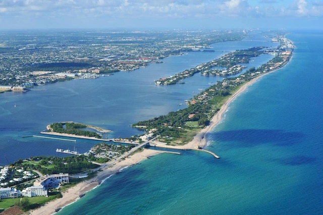 aerial view featuring a beach view and a water view