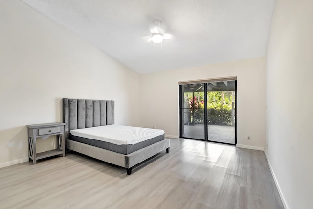 bedroom with baseboards, wood finished floors, access to exterior, and a ceiling fan