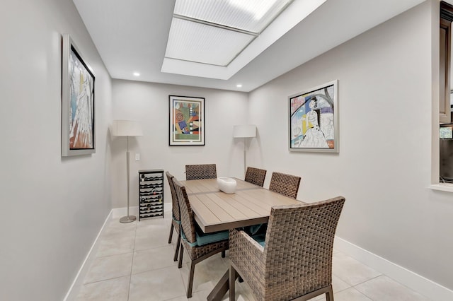 dining room featuring light tile patterned floors, recessed lighting, and baseboards