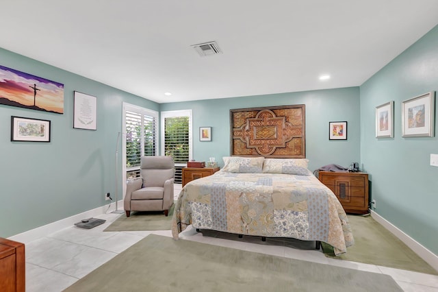 bedroom with light tile patterned floors, visible vents, baseboards, and recessed lighting