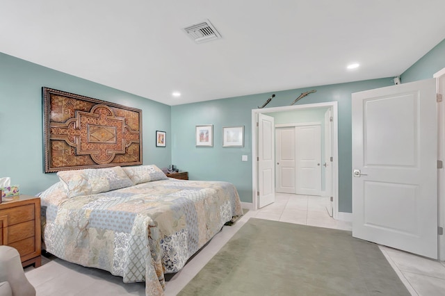 bedroom with light tile patterned flooring, visible vents, recessed lighting, and baseboards