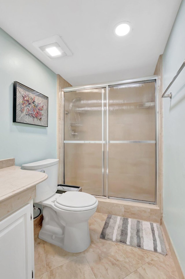 full bathroom featuring visible vents, a shower stall, toilet, and vanity