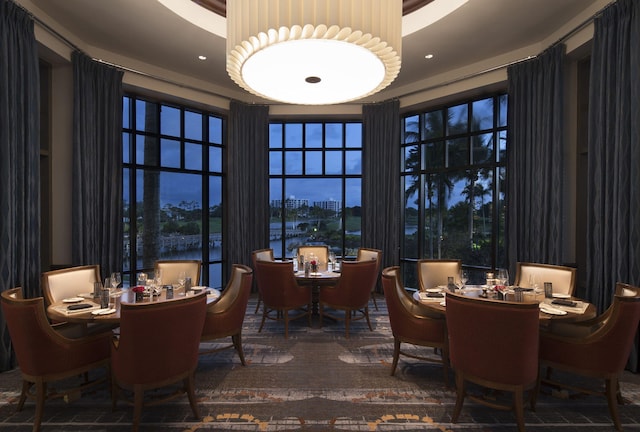 dining space with a water view