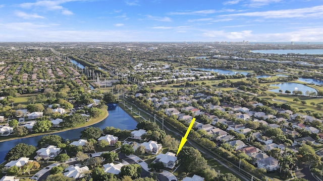 aerial view featuring a residential view and a water view