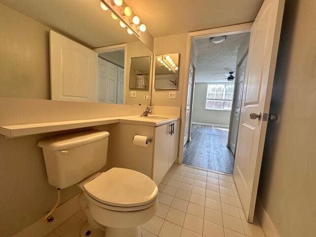 7896 Sonoma Springs Cir Unit 204, Lake Worth, FL 33463 - bathroom with tile patterned floors, toilet, vanity, and baseboards