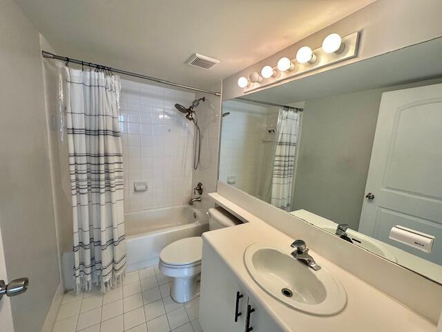 7896 Sonoma Springs Cir Unit 204, Lake Worth, FL 33463 - bathroom featuring visible vents, toilet, shower / tub combo with curtain, tile patterned floors, and vanity