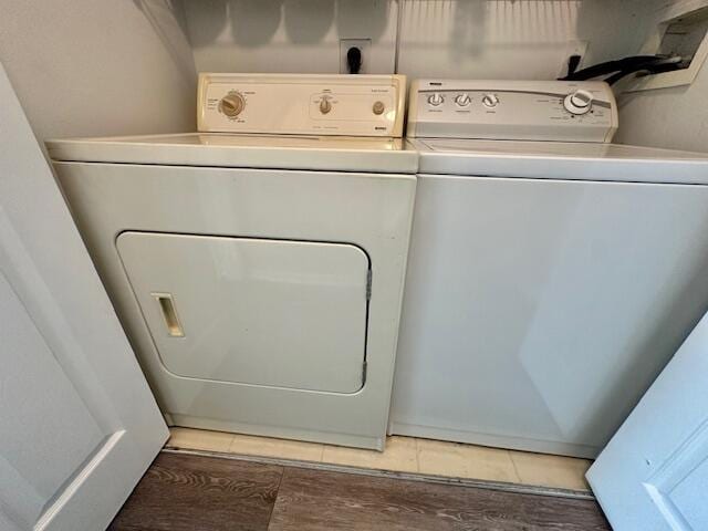 7896 Sonoma Springs Cir Unit 204, Lake Worth, FL 33463 - washroom featuring light wood finished floors, laundry area, and washer and dryer