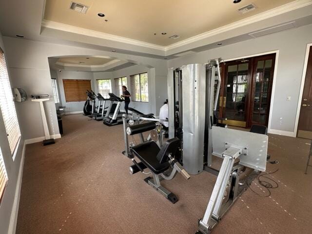 7896 Sonoma Springs Cir Unit 204, Lake Worth, FL 33463 - gym with visible vents, a raised ceiling, baseboards, and ornamental molding