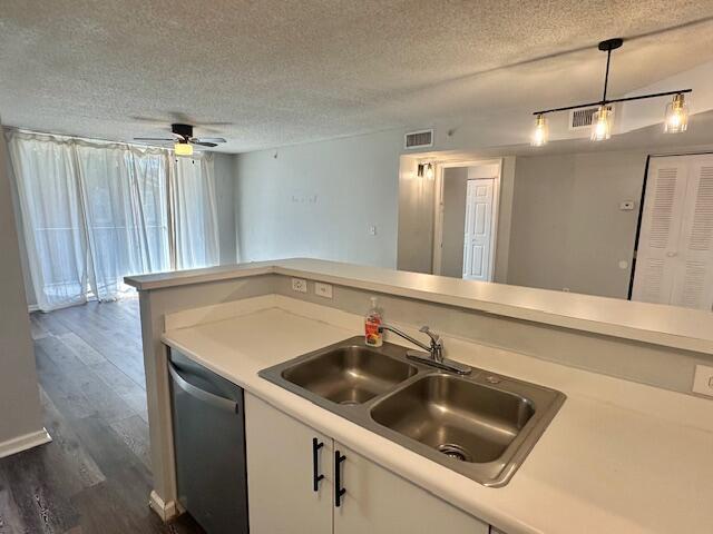 7896 Sonoma Springs Cir Unit 204, Lake Worth, FL 33463 - kitchen featuring visible vents, a sink, light countertops, dishwasher, and ceiling fan