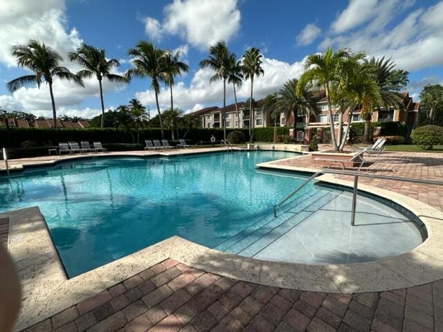 7896 Sonoma Springs Cir Unit 204, Lake Worth, FL 33463 - community pool with a patio