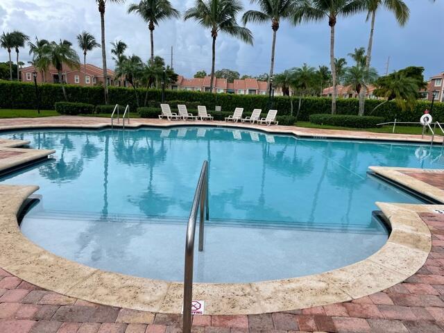 7896 Sonoma Springs Cir Unit 204, Lake Worth, FL 33463 - community pool featuring fence