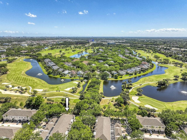 114 Radcliffe Ct, Jupiter, FL 33458 - aerial perspective of suburban area with a golf club, a large body of water, and a tree filled landscape