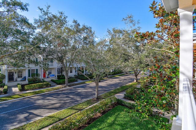 view of street with sidewalks and curbs