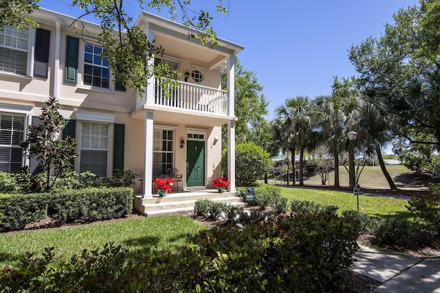 114 Radcliffe Ct, Jupiter, FL 33458 - back of property with a balcony and stucco siding