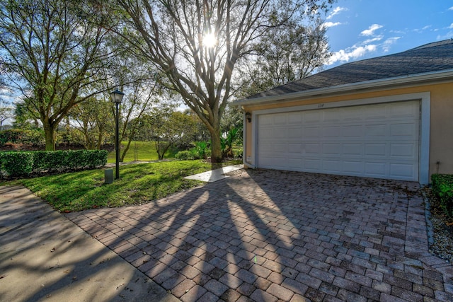 garage with driveway