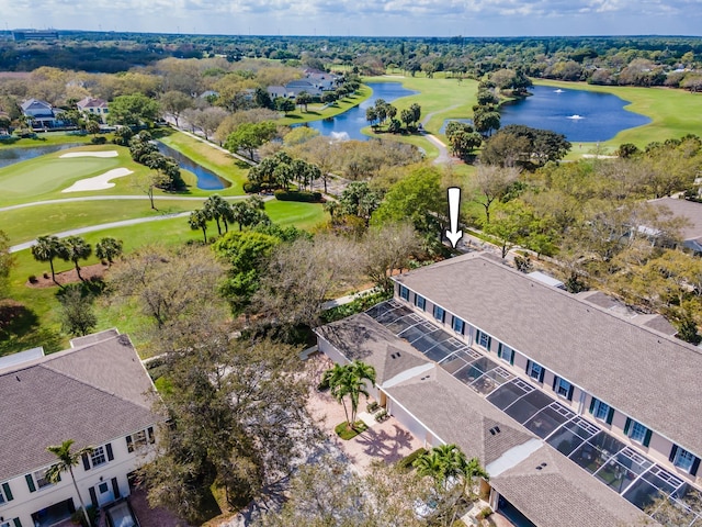 bird's eye view with view of golf course and a water view