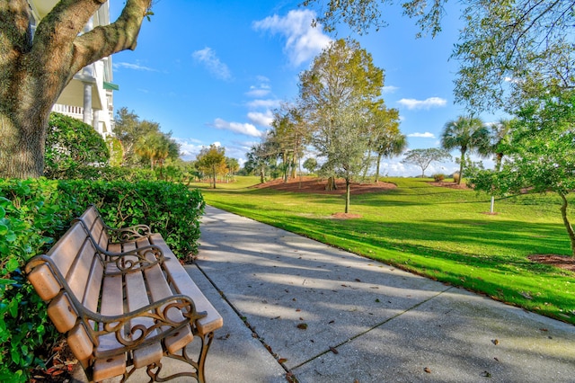 surrounding community featuring a lawn