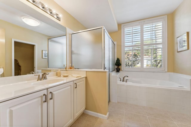 full bath with vanity, tile patterned floors, a bath, and an enclosed shower