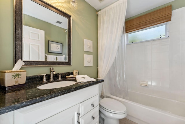 bathroom featuring shower / bath combination with curtain, visible vents, toilet, and vanity