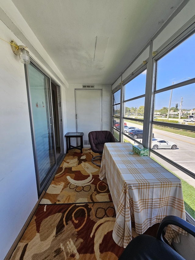 sunroom / solarium with visible vents