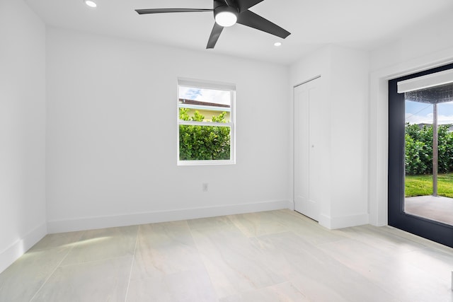 unfurnished room with plenty of natural light, recessed lighting, baseboards, and ceiling fan