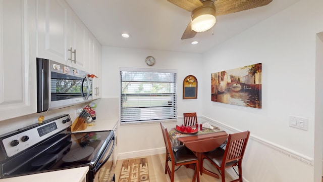 dining area featuring recessed lighting, baseboards, a ceiling fan, and light wood finished floors