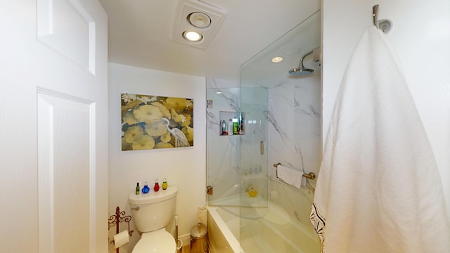 bathroom featuring recessed lighting, toilet, and a combined bath / shower with marble appearance