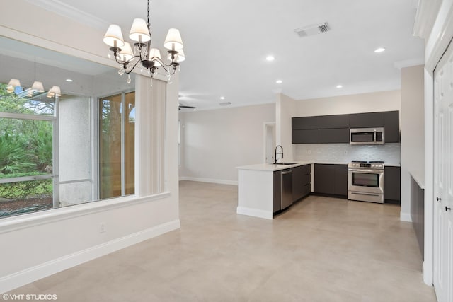 kitchen featuring visible vents, a sink, light countertops, stainless steel appliances, and modern cabinets