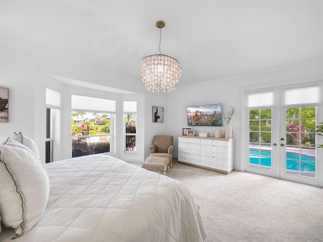 bedroom featuring multiple windows, crown molding, carpet, and access to outside