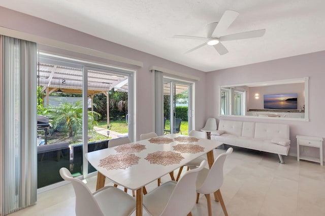 dining room featuring a ceiling fan