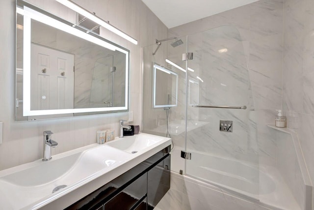 full bath featuring double vanity and a sink