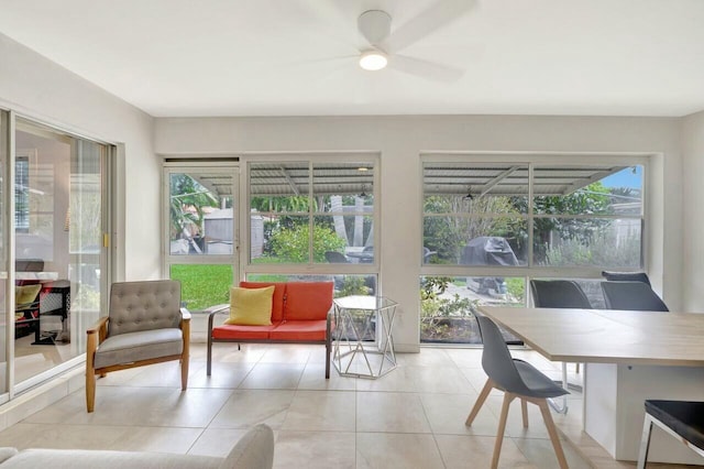sunroom / solarium featuring tile patterned flooring