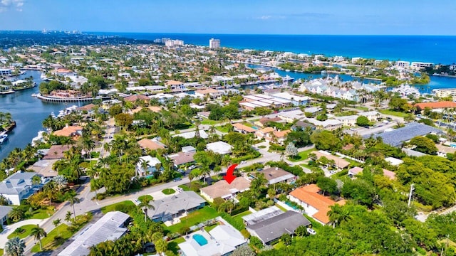 bird's eye view with a water view and a residential view