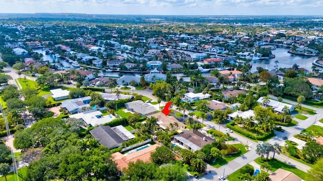 aerial view with a residential view and a water view
