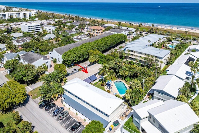 aerial view featuring a view of the beach and a water view