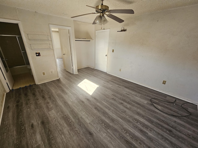 unfurnished bedroom with a closet, a textured ceiling, ceiling fan, and wood finished floors