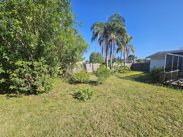 view of yard featuring fence