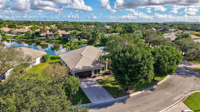 aerial view featuring a residential view and a water view