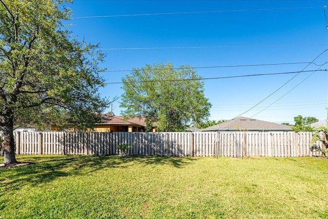 view of yard featuring fence